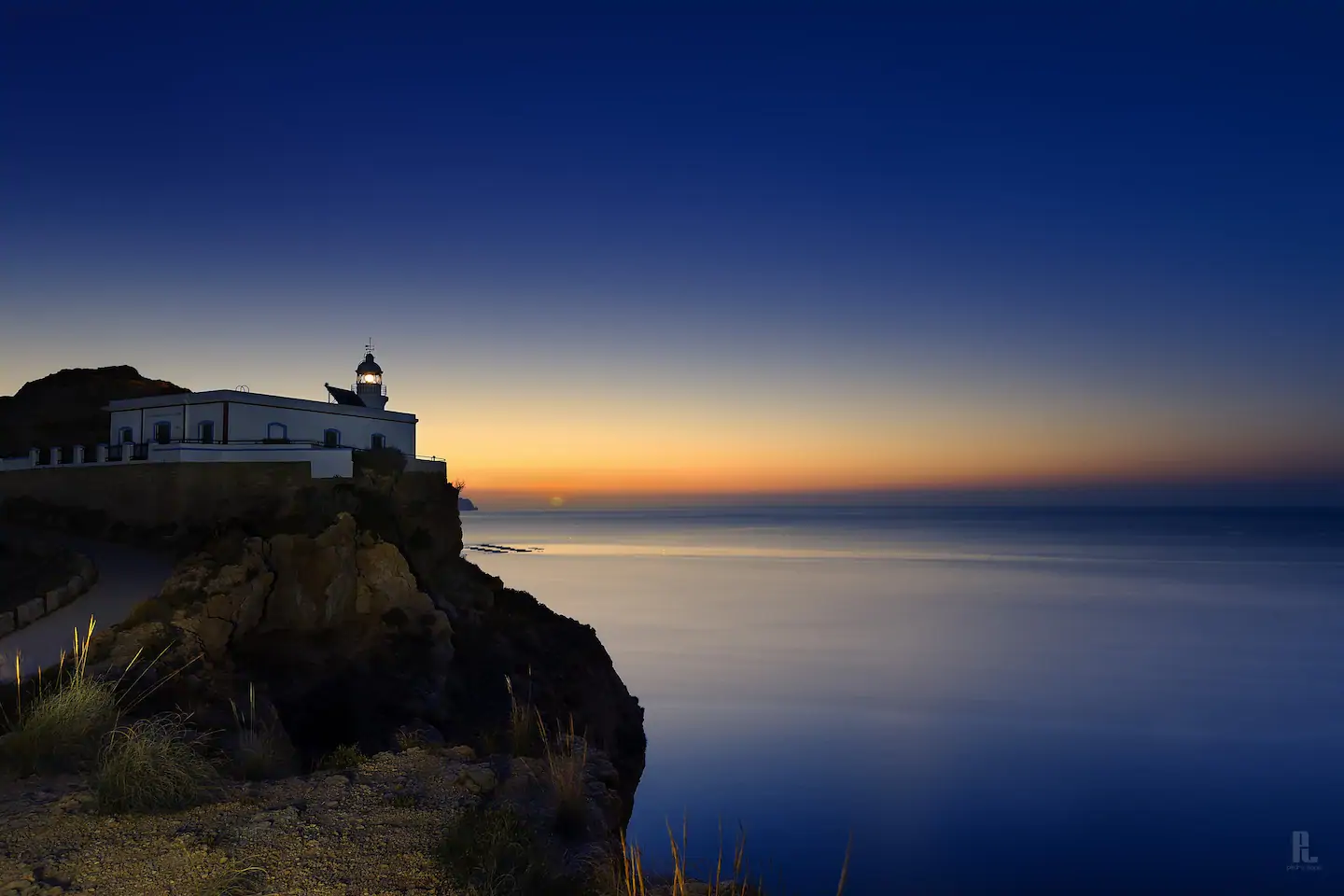Faro de l'Albir al atardecer